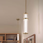 Preview: Elstead Riven LED Pendelleuchte dimmbar warmweiss 15W Champagnerbronze Stahl Riffelglas Ø13cm