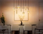 Preview: Globo Pendelleuchte Daren 4-flammig E27 + 3-flammig GU10 Schwarz matt amber Metall Glas 130x94,5cm