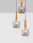Preview: Nova Luce Pendelleuchte Maho 3-flammig 3xE27 Rauchgrau Messinggold Glas Metall Ø36cm 9236314