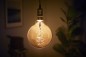 Mobile Preview: Philips große Filament Lampe Gold G200 LED Globoe E27 4,5W 300lm extra-warmweiss 1800K wie 25W